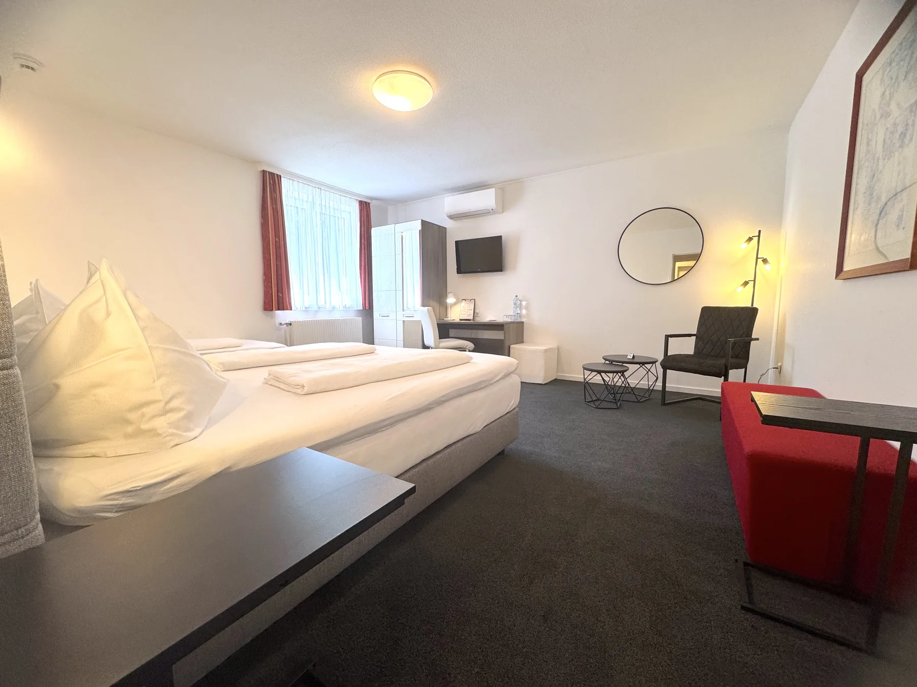 Geräumiges Dreibettzimmer im Hotel Altmann Wien